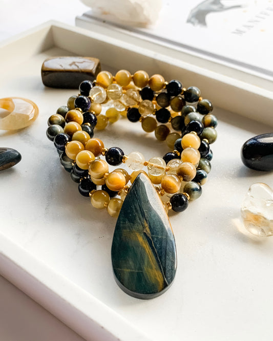 UNLEASH YOUR POTENTIAL Mala Necklace | Blue Goldstone, Blue Tiger Eye, Citrine + Honey Tiger Eye